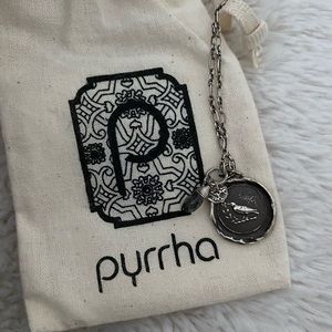 Pyrrha necklace and sparrow charm with blue pendant